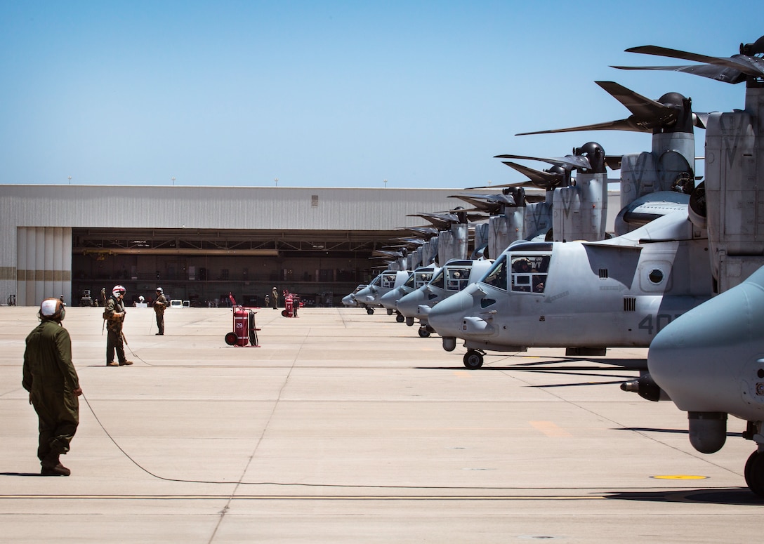MV-22B Ospreys with Marine Medium Tiltrotor Squadron (VMM) 764, 4th Marine Aircraft Wing, lineup on the flight line before taking off from Marine Corps Air Station Miramar, Calif., June 12. Once a year reserve components of the Marine Corps go on two-week annual training detachments to sharpen their skills in their military occupational specialties. (U.S. Marine Corps photo by Sgt. Becky Cleveland)