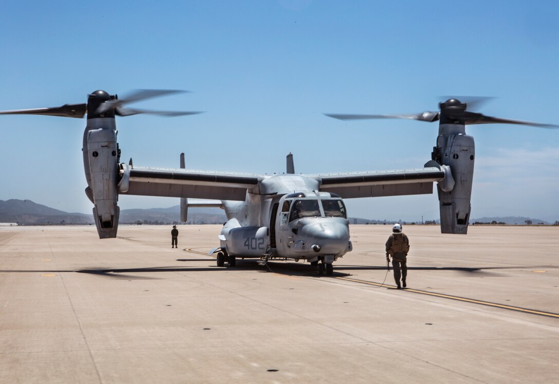 An MV-22B Osprey with Marine Medium Tiltrotor Squadron (VMM) 764, 4th Marine Aircraft Wing, waits on the flight line before taking off from Marine Corps Air Station Miramar, Calif., June 12. Once a year reserve components of the Marine Corps go on two-week annual training detachments to sharpen their skills in their military occupational specialties. (U.S. Marine Corps photo by Sgt. Becky Cleveland)