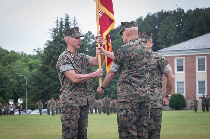 U.S. Marine Corps Lt. Gen. David H. Berger, right, out going commanding general, Marine Corps Combat Development Command (MCCDC), and out going deputy commandant, Combat Development and Integration (CD&I), transfers command to Lt. Gen. Eric M. Smith, oncoming commanding general, MCCDC, and oncoming deputy commandant, CD&I, at Lejeune Field, Quantico, Va., June 13, 2019. Berger joined MCCDC August 2018. (U.S. Marine Corps photo by Cpl. Cristian L. Ricardo)