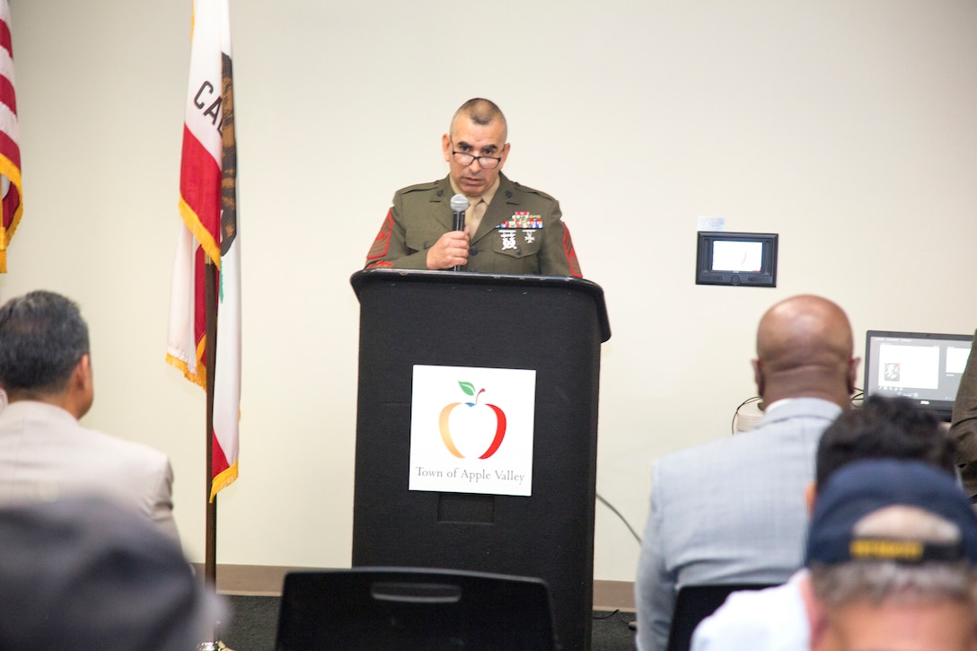 Sergeant Major Sergio MartinezRuiz, base sergeant major, Marine Corps Logistics Base Barstow, speaking at the Veterans Resource Fair in Apple Valley, May 30. MartinezRuiz urged fairgoers to take advantage of all the experts and information in the room to help navigate their way through the sometimes tricky application process for medical disability, education and other benefits offered to veterans.