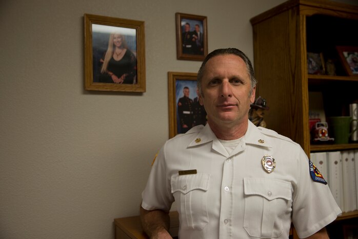 MARINE CORPS AIR STATION YUMA, Ariz. (May 1, 2019) – Years of dedicated service has not gone unnoticed when it comes to Michael R. Batson Fire Chief Marine Corps Air Station Yuma. In April 2019, Chief Batson was recognized for his 25 years of service to the Marine Corps. Chief Batson was enlisted in the Marine Corps for 4 years spending 3 of them at Marine Corps Air Station Yuma with Air Traffic control. In his daily tasks he is responsible for operations, which include the firefighters, vehicles, technical, HAZMAT, and medical emergencies. When asked about what has kept him going all of the years his response was simple “I enjoy working with and working for Marines, I would much rather prefer to work here than anywhere else”.

(U.S. Marine Corps photo by Lance Cpl. Joel Soriano)