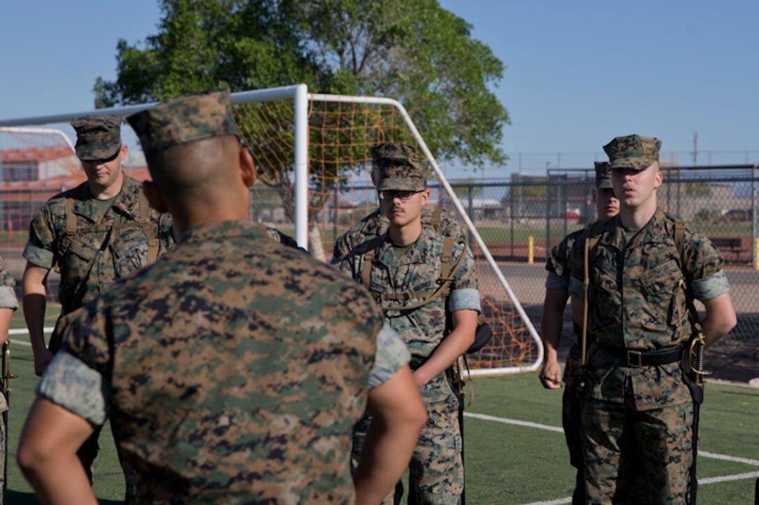 U.S. Marines stationed at Marine Corps Air Station Yuma practice conducting Sword Manual and drill as part of their corporals course curriculum at MCAS Yuma Ariz., May 7, 2019. Corporals Course is a leadership class designed to teach Marines the fundamentals of being a noncommissioned officer. (U.S. Marine Corps photo by Lance Cpl. Joel Soriano)
