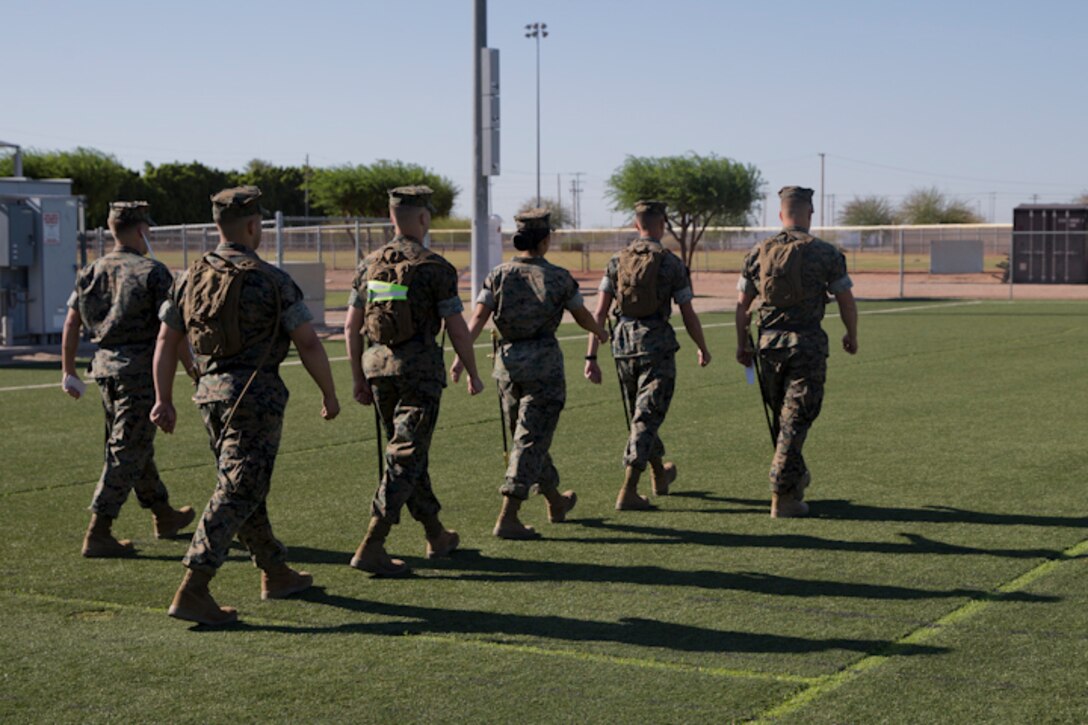 U.S. Marines stationed at Marine Corps Air Station Yuma practice conducting Sword Manual and drill as part of their corporals course curriculum at MCAS Yuma Ariz., May 7, 2019. Corporals Course is a leadership class designed to teach Marines the fundamentals of being a noncommissioned officer. (U.S. Marine Corps photo by Lance Cpl. Joel Soriano)