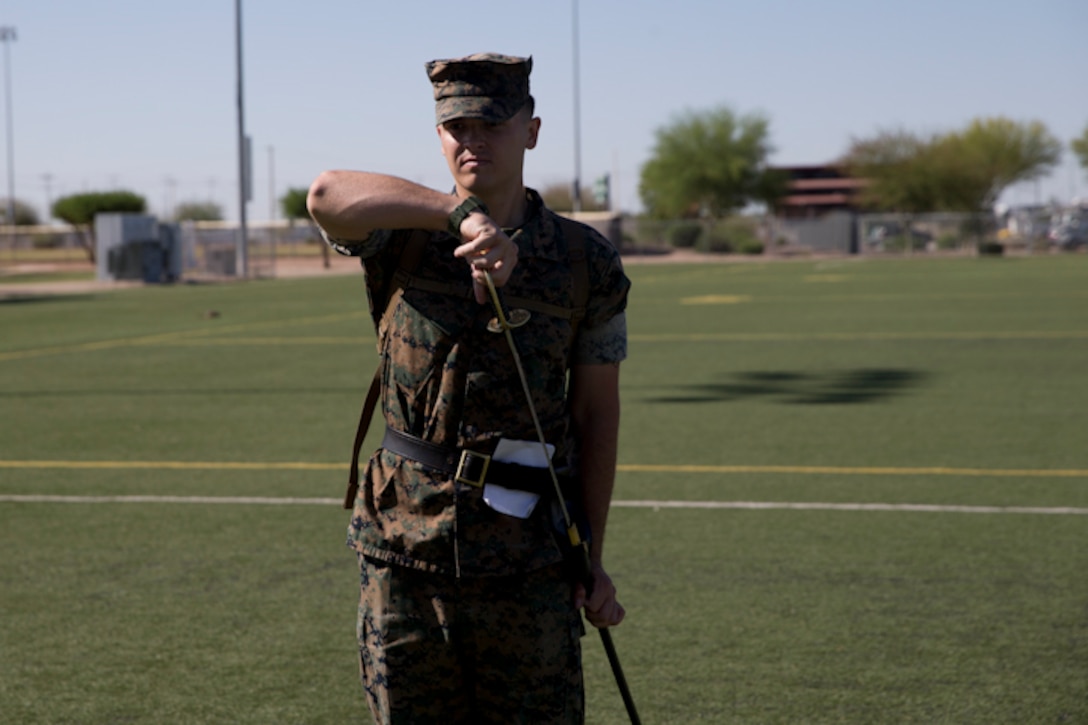 U.S. Marines stationed at Marine Corps Air Station Yuma practice conducting Sword Manual and drill as part of their corporals course curriculum at MCAS Yuma Ariz., May 7, 2019. Corporals Course is a leadership class designed to teach Marines the fundamentals of being a noncommissioned officer. (U.S. Marine Corps photo by Lance Cpl. Joel Soriano)