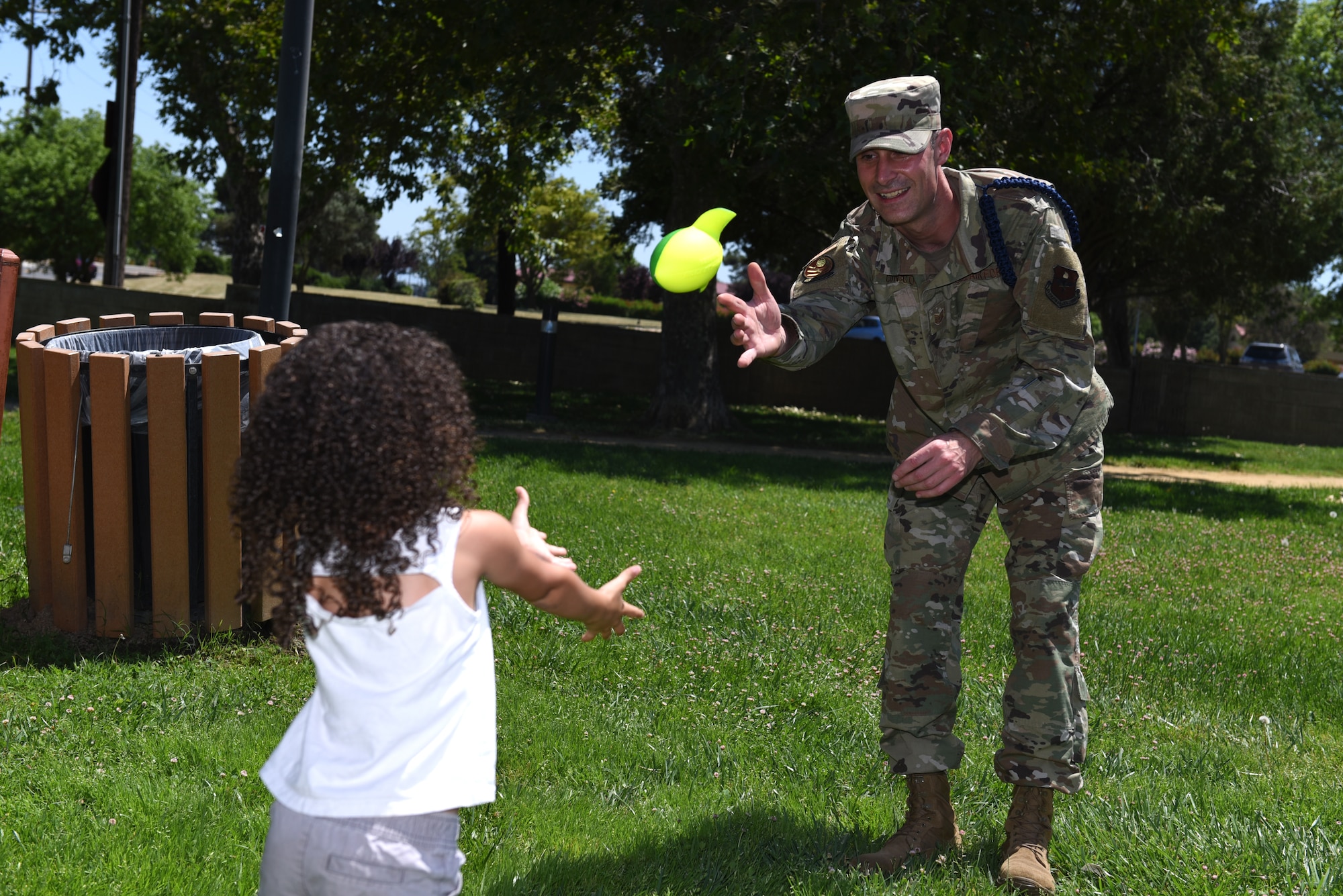 U.S. Air Force Tech. Sgt. Joshua Cunico, 373rd Training Squadron military training unit flight chief, plays catch with his daughter, Rowan, 3, June 12, 2019, at Travis Air Force Base, California. Cunico and his family cherish Father’s Day this year because they get to spend it together. Cunico has deployed twice since becoming a dad in 2014. (U.S. Air Force photo by Airman 1st Class Cameron Otte)