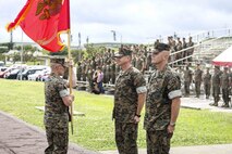 U.S. Marine Corps Lt. Col. Robert D. Wolfe II salutes U.S. Marine Corps Lt. Col. Kevin M. Chunn during a change of command ceremony June 4, 2019 on Camp Kinser, Okinawa, Japan. Chunn, a native of Bernalillo, New Mexico, relinquished command of 3rd Supply Battalion, Combat Logistics Regiment 35, 3rd Marine Logistics Group, to Wolfe II, a native of Columbus, Mississippi, during the ceremony. (U.S. Marine Corps photo by Cpl. Joshua S. Pinkney)