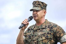 U.S. Marine Corps Lt. Col. Kevin M. Chunn addresses Marines, Sailors and families during a change of command ceremony June 4, 2019 on Camp Kinser, Okinawa, Japan. Chunn, a native of Bernalillo, New Mexico, relinquished command of 3rd Supply Battalion, Combat Logistics Regiment 35, 3rd Marine Logistics Group, to Lt. Col. Robert D. Wolfe II, a native of Columbus, Mississippi, during the ceremony. (U.S. Marine Corps photo by Cpl. Joshua S. Pinkney)