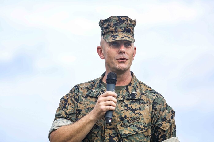 Lt. Col. Robert D. Wolfe II addresses Marines, Sailors and guests during a change of command ceremony June 4, 2019 on Camp Kinser, Okinawa, Japan. Lt. Col. Kevin M. Chunn, a native of Bernalillo, New Mexico, relinquished command of 3rd Supply Battalion, Combat Logistics Regiment 35, 3rd Marine Logistics Group, to Wolfe II, a native of Columbus, Mississippi, during the ceremony. (U.S. Marine Corps photo by Cpl. Joshua S. Pinkney)