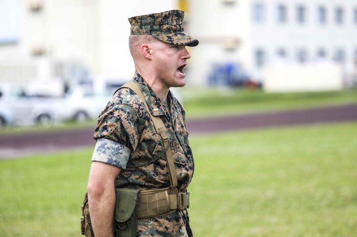 U.S. Marine Corps 2nd Lt. Bryan Towers sounds the adjutant’s call during a change of command ceremony June 4, 2019 on Camp Kinser, Okinawa, Japan. Lt. Col. Kevin M. Chunn, a native of Bernalillo, New Mexico, relinquished command of 3rd Supply Battalion, Combat Logistics Regiment 35, 3rd Marine Logistics Group, to Lt. Col. Robert D. Wolfe II, a native of Columbus, Mississippi, during the ceremony. Towers, the adjutant for 3rd Supply Bn., CLR-35, 3rd MLG, is a native of Volant, Pennsylvania. (U.S. Marine Corps photo by Cpl. Joshua S. Pinkney)
