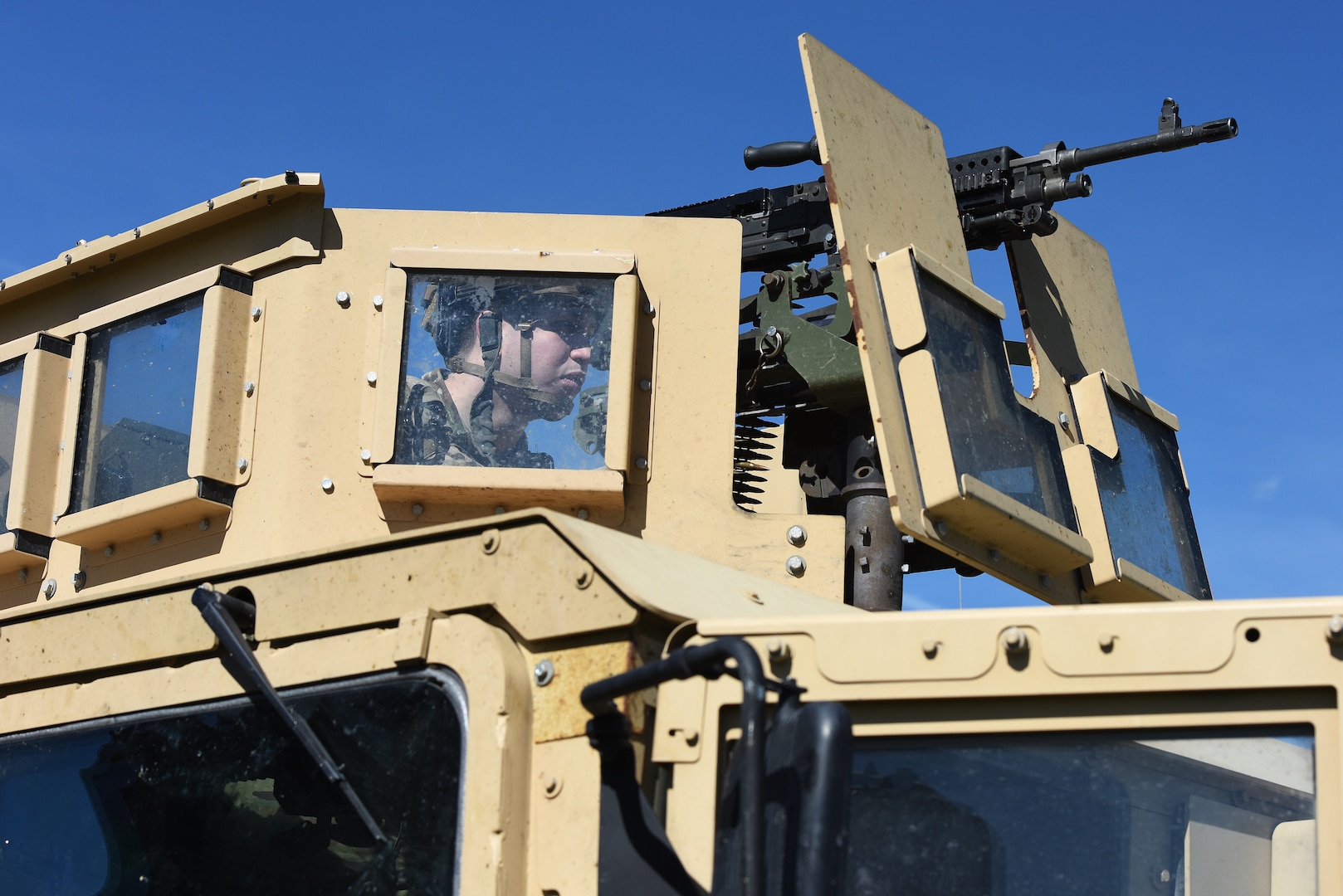 Airman 1st Class Evan Tomasko, 841st Missile Security Forces Squadron missile security operator, mans a turret in a Humvee during an integrated recapture and recovery exercise June 11, 2019, at an intercontinental ballistic missile launch facility near Simms, Mont.