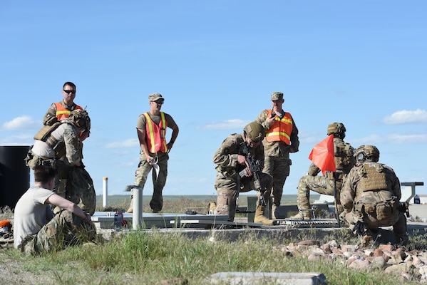 Airmen survey a launch facility integrated recapture and recovery exercise June 11, 2019, at an intercontinental ballistic missile launch facility near Simms, Mont.
