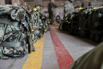 U.S. Marine Corps air delivery specialists prepare equipment for an air delivery exercise June 6, 2019 on Marine Corps Air Station Futenma, Okinawa, Japan. Air delivery specialists with Air Delivery Platoon, Landing Support Company, 3rd Transportation Support Battalion, Combat Logistics Regiment 3, 3rd Marine Logistics Group, employed the Joint Precision Airdrop System to enhance mission readiness by providing hands-on rehearsals. The JPADS is an autonomous system designed to provide accurate delivery of cargo and supplies to ground component forces. (U.S. Marine Corps photo by Lance Cpl. Mark Fike)