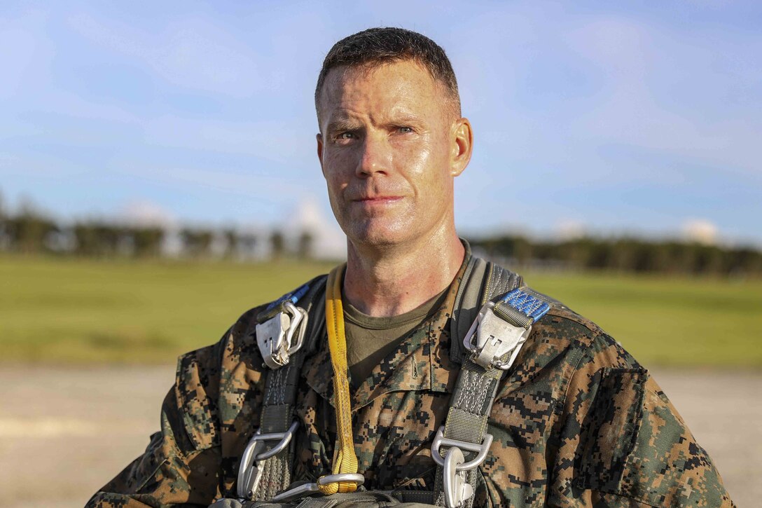 U.S. Marine Corps Lt. Col. Matthew Mulvey prepares to parachute from an MV-22 Osprey June 6, 2019 at Ie Shima, Okinawa, Japan. Air delivery specialists with Air Delivery Platoon, Landing Support Company, 3rd Transportation Support Battalion, Combat Logistics Regiment 3, 3rd Marine Logistics Group, employed the Joint Precision Airdrop System to enhance mission readiness by providing hands-on rehearsals. The JPADS is an autonomous system designed to provide accurate delivery of cargo and supplies to ground component forces. Mulvey, the battalion commander for 3rd TSB, CLR-3, 3rd MLG, is a native of Cherryville, North Carolina. (U.S. Marine Corps photo by Lance Cpl. Mark Fike)