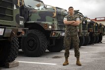 U.S. Marine Corps Cpl. Chad R. Cruz stands in front of an MTVR 7-ton truck at Camp Kinser, Okinawa, Japan on April 23, 2019. Cruz was awarded the Motor Transportation Operator of the Year award for his hard work and enthusiasm as a motor transportation operator. Cruz, a native of Ewa Beach, Hawaii, is with Headquarters and Service Company, 3rd Supply Battalion, Combat Logistics Regiment 35, 3rd Marine Logistics Group. (U.S. Marine Corps photo by Lance Cpl. Armando Elizalde)