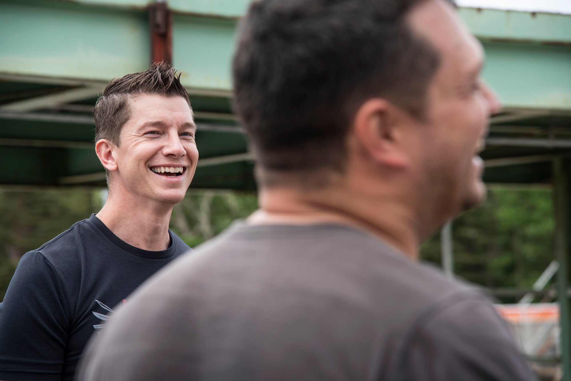 U.S. Air Force Master Sgt. Michael Yurco, the 35th Security Forces Squadron echo-flight chief, laughs with a fellow rider at Aomori Speed Park in Aomori City, Japan, May 28, 2019. Yurco teaches a motorcycle fundamentals course at Misawa Air Base where riders learn how to safely and properly ride their sports bikes through Aomori Prefecture’s terrain and the installation. (U.S. Air Force photo by Senior Airman Sadie Colbert)