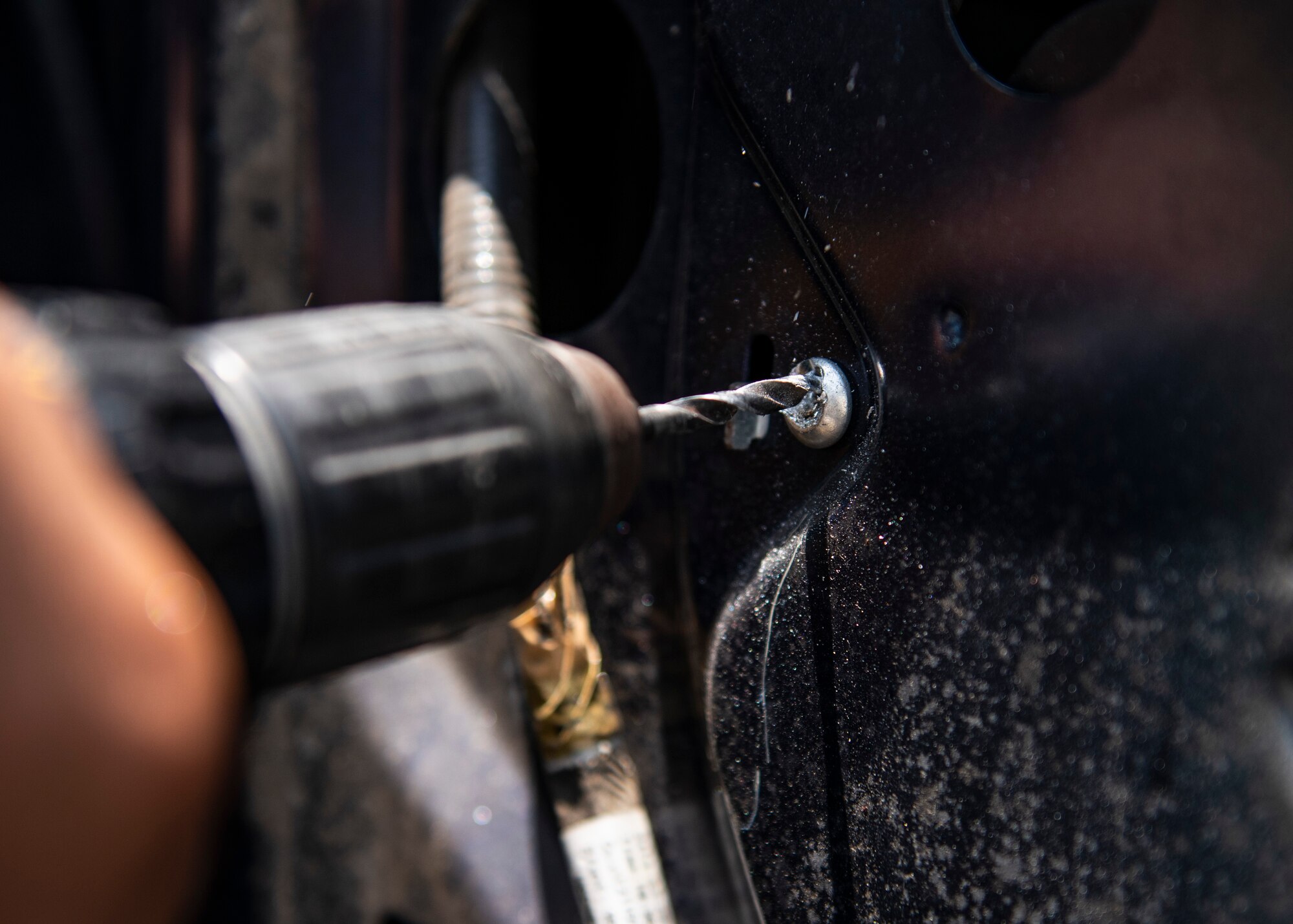 U.S. Air Force Senior Airman Kayne Brown, vehicle mechanic assigned temporarily assigned to the 325th Logistics Readiness Squadron, repairs a broken vehicle June 4, 2019, at Tyndall Air Force Base, Florida.