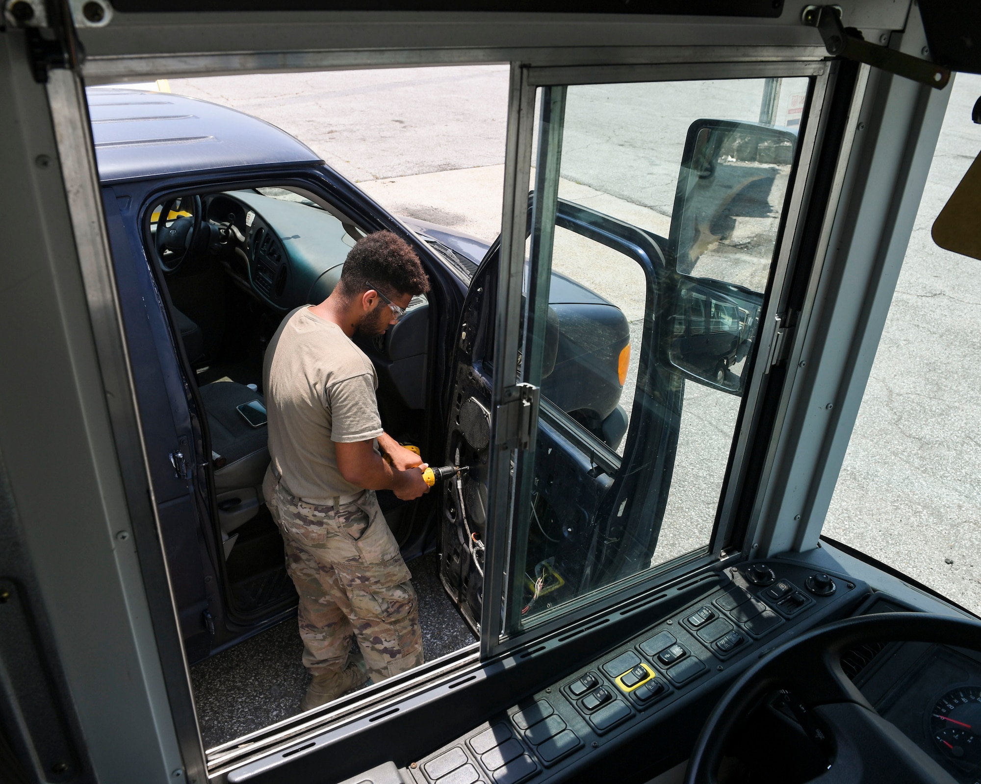U.S. Air Force Senior Airman Kayne Brown, vehicle mechanic temporarily assigned to the 325th Logistics Readiness Squadron, repairs a broken vehicle June 4, 2019, at Tyndall Air Force Base, Florida.