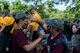 U.S. Air Force Junior ROTC cadets participating in the Cadet Leadership Course apply camouflage face paint to each other June 5, 2019 at Scott Air Force Base, Ill. During the security forces day of the course, the cadets painted their faces to learn to blend in with an outdoors surrounding so as not to be seen by an enemy. (U.S. Air Force photo by Senior Airman Daniel Garcia)