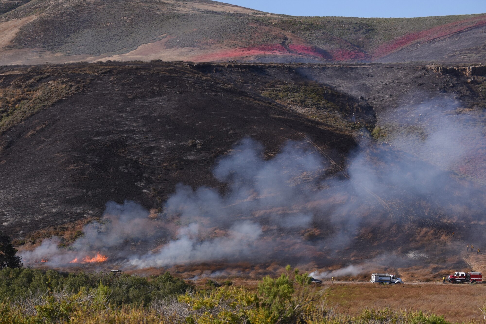 30th Space Wing firefighters work with the Santa Barbara Fire Department to extinguish the Rancho Fire June 13, 2019 at Vandenberg Air Force Base, Calif. The fire burned approximately 140 acres near Point Sal and El Rancho roads.