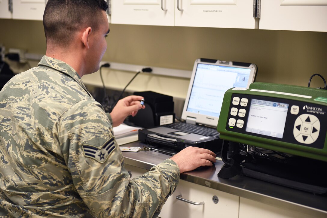 Senior Airman Michael Mannarino, 14th Medical Operations Squadron bioenvironmental technician, uses the field HAPSITE ER Chemical Identification System June 11, 2019, on Columbus Air Force Base, Mississippi. Bioenvironmental Airmen are responsible for testing the air supply in aircraft, water, and the air on base to ensure no dangerous chemicals can contaminate the base population or harm the pilot training mission. (U.S. Air Force photo by Senior Airman Keith Holcomb)