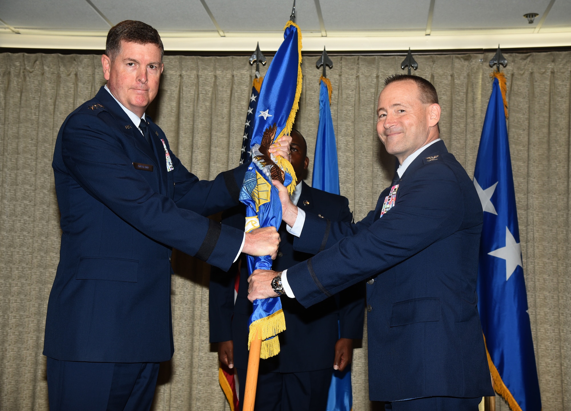 Col. Paul Filcek assumed command of the 72nd Air Base Wing during a formal ceremony at the Tinker Event Center June 7. Air Force Sustainment Center Commander Lt. Gen. Gene Kirkland presided over the ceremonyin which Col. Kenyon Bell bid farewell to the Wildcatters of the 72ABW. Filcek will lead 3,000 Airmen and civilians as the new commander and will be responsible for $5.4 billion in resources and a $311 million operating budget. The 72ABW provides installation support for over 27,000 personnel assigned to the Headquarters Air Force Sustainment Center, Oklahoma City Air Logistics Complex, 552nd Air Control Wing, Navy Strategic Communications Wing ONE, 507th Air Refueling Wing, 448th Supply Chain Management Wing and 45 other associate units including the Defense Logistics Agency, Defense Information Systems Agency, Defense Finance and Accounting Service and the 38th Cyberspace Engineering Installation Group. (U.S. Air Force photo/Kelly White)