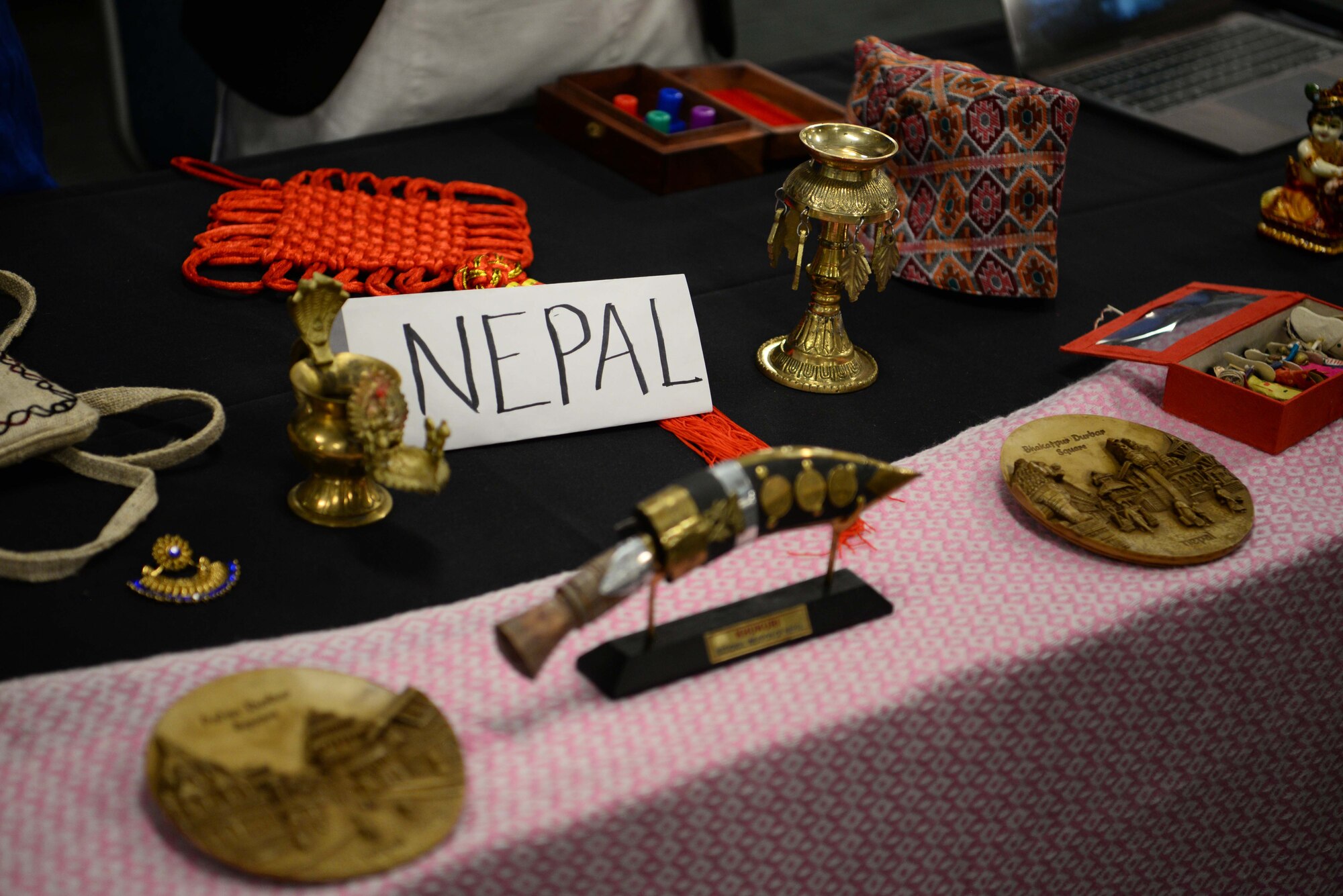 Nepal ornaments on display, June 7, 2019, on Columbus Air Force Base, Miss. The event brought together many volunteers by getting the community involved to help out with the booths and share bits and pieces from their cultures. (U.S. Air Force photo by Airman 1st Class Jake Jacobsen)
