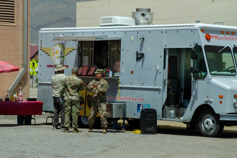 Soldiers order from a food truck.