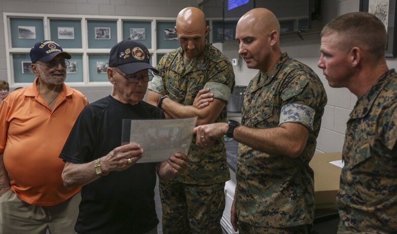 Drill instructors and command leadership from 2nd Recruit Training Battalion enjoy fellowship with Marines from the Parris Island Recruit Training graduating class of 1955 at the Brig and Brew on Parris Island, S.C. June 6th, 2019. Approximately 20 former members of 2nd Recruit Training Battalion attended the gathering to share memories of when they attended Recruit Training. The group has reunited several times in the past, but this year’s reunion was the first to be held at the depot.
