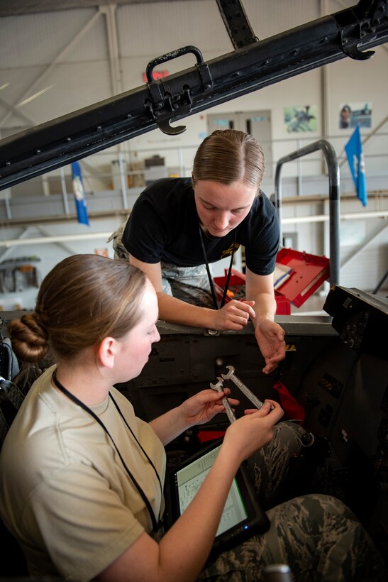 Airman 1st Class Christine Smith and Airman 1st Class Kaylie Cunningham, 364th Training Squadron electrical and environmental apprentice course students, remove and install an oxygen regulator on an F-15 Eagle at Sheppard Air Force Base, Texas, June 14, 2019. Oxygen is very important especially when pilots fly to certain altitudes where it gets more thin. Without the regulator the pilot won't get a steady supply of oxygen and may lose consciousness. (U.S. Air Force photo by Airman 1st Class Pedro Tenorio)