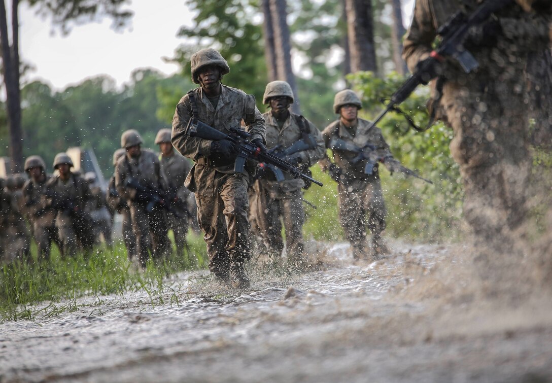 Recruits with Alpha Company participate in the Crucible on Parris Island, S.C. June 14, 2019. The Crucible is a 54-hour culminating event that requires recruits to work as a team and overcome challenges in order to earn the title United States Marine.

(U.S. Marine Corps photo by Sgt. Dana Beesley)