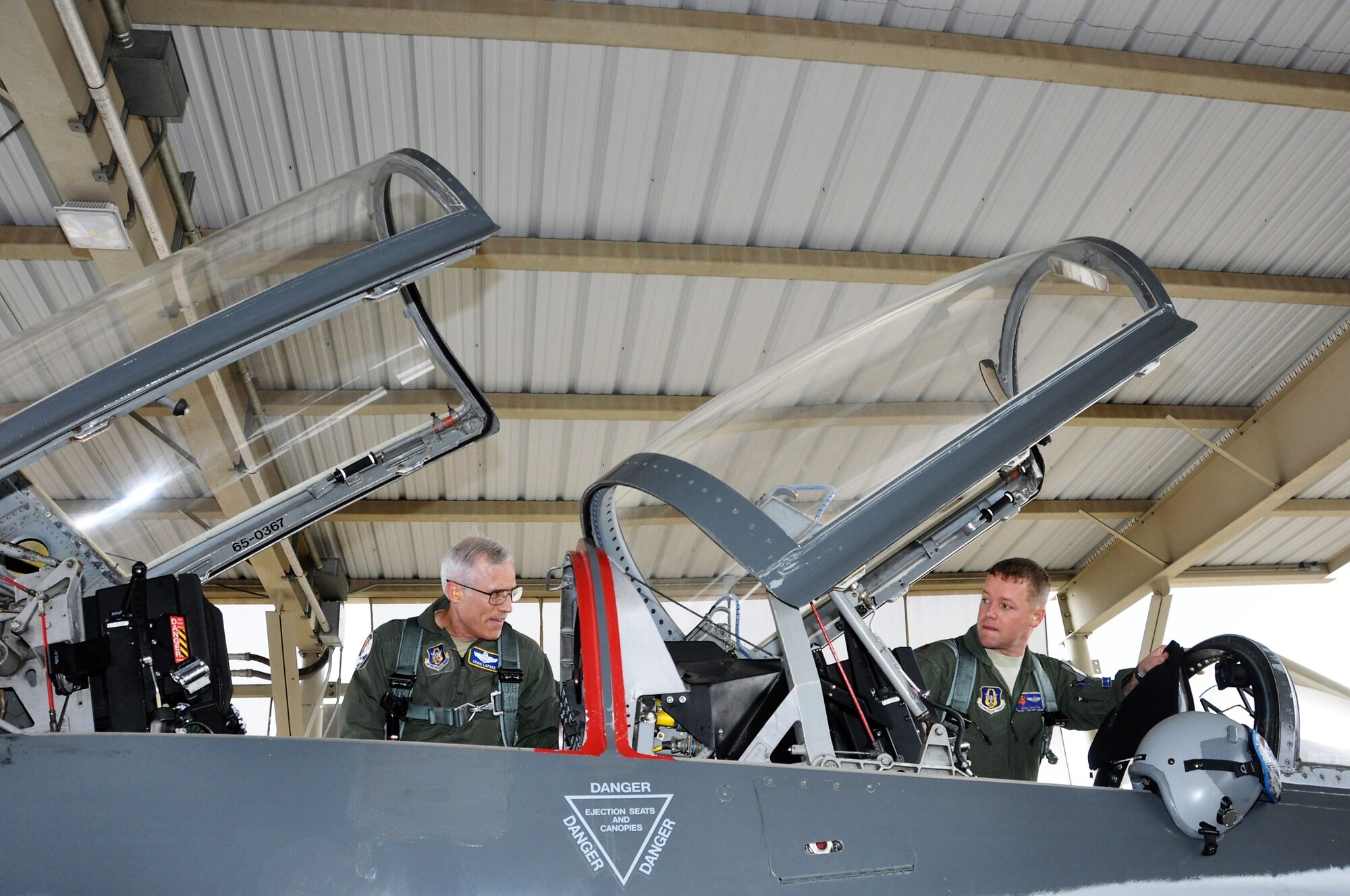 Maj. Gen. Craig L. La Fave, commander of the 22nd Air Force, disembarks a 910th Airlift Wing C-130H Hercules in front of a C-130 aircraft hangar on Youngstown Air Reserve Station after taking part in an aerial spray demonstration flight on June 2. La Fave visited YARS from June 1 through 3 making his way around the station and receiving briefings from several of the 910th AW’s squadrons on how they provide a current, qualified, mission-ready force so the Air Force can fly, fight and win in air, space and cyberspace. (U.S. Air Force photo/Airman 1st Class Noah J. Tancer)
