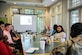 The inaugural participants in the new Summer Intern Program attend an orientation briefing June 10, 2019, at the Wrenwoods Golf Course at Joint Base Charleston, S.C.