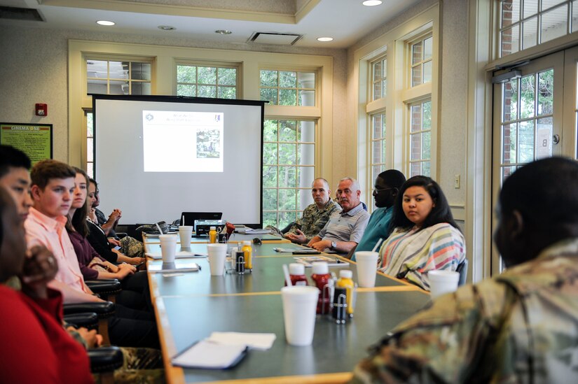 The inaugural participants in the new Summer Intern Program attend an orientation briefing June 10, 2019, at the Wrenwoods Golf Course at Joint Base Charleston, S.C.
