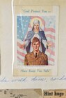 A religious card taped into a scrapbook compiled by Aida Bonsonto showcases her husband’s military service during World War II.