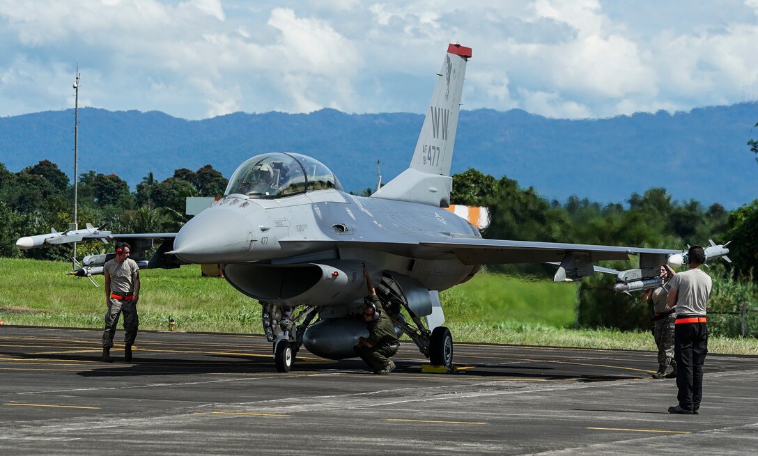 A U.S. Air Force F-16C Fighting Falcon assigned to the 13th Expeditionary Fighter Squadron, 35th Fighter Wing based out of Misawa Air Base, Japan, prepares to takeoff during exercise Cope West 18 (CW18) from Sam Ratulangi International Airport, Indonesia, March 12, 2018. CW18 is a Pacific Air Forces-sponsored, bilateral, tactical fighter aircraft exercise involving the U.S. and Indonesian air forces and is designed to advance interoperability and build upon already established partnerships between the air forces. (U.S. Air Force photo by Tech. Sgt. Richard Ebensberger)