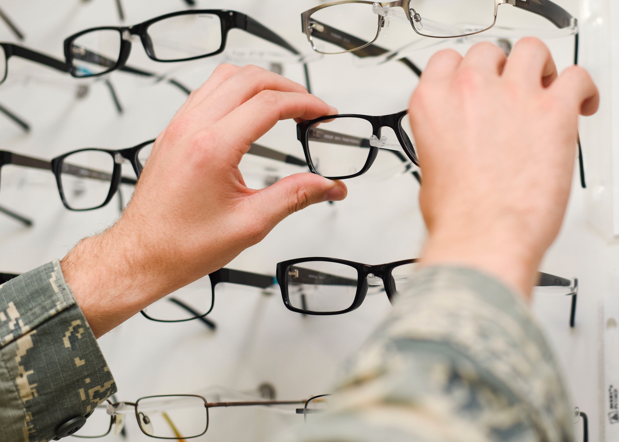 U.S. Air Force Staff Sgt. Jordan Cutaia, 325th Medical Group optometry technician, picks out glasses June 6, 2018 at Tyndall Air Force Base, Florida.
