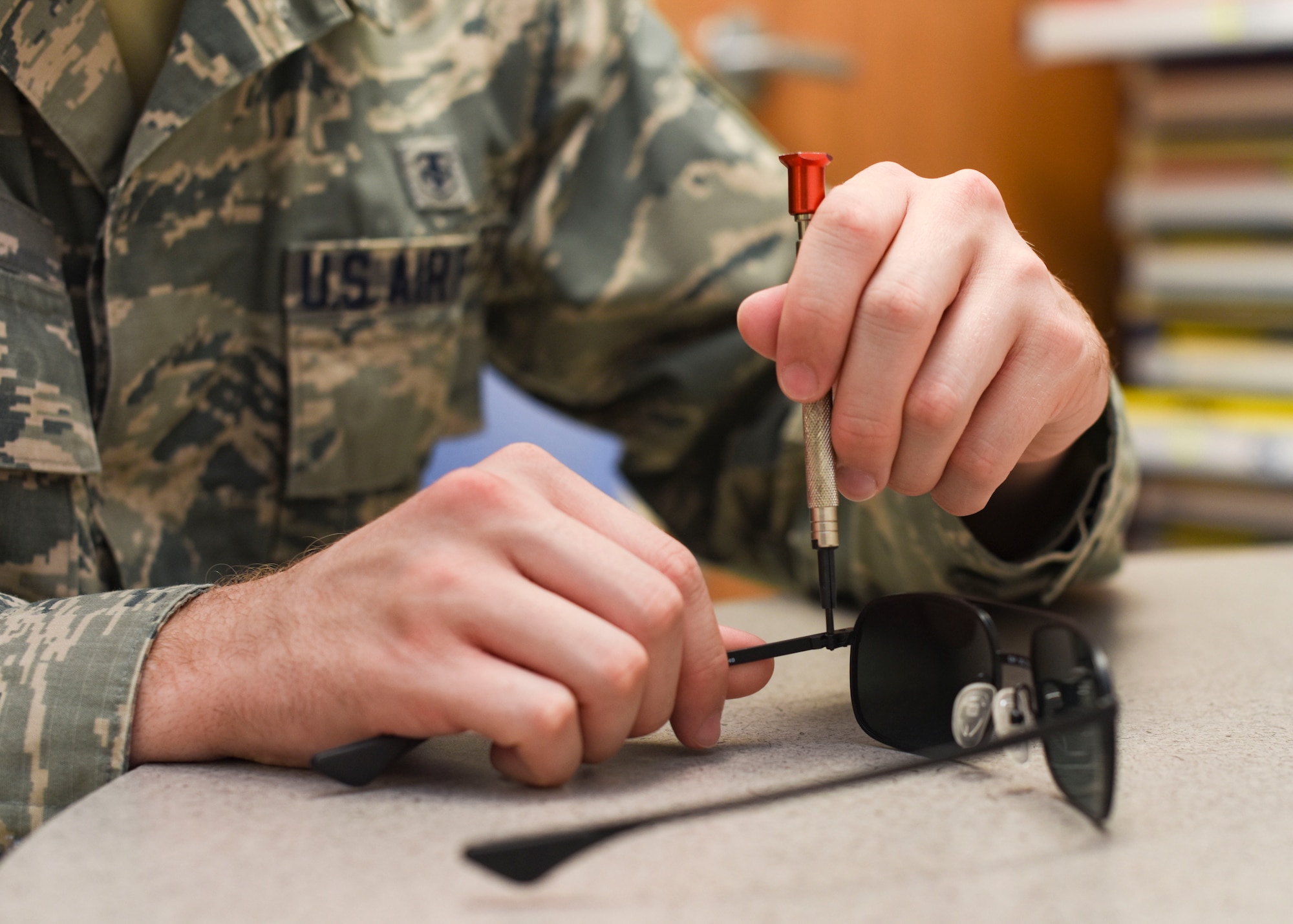 U.S. Air Force Staff Sgt. Jordan Cutaia, 325th Medical Group optometry technician, repairs glasses June 6, 2018 at Tyndall Air Force Base, Florida.