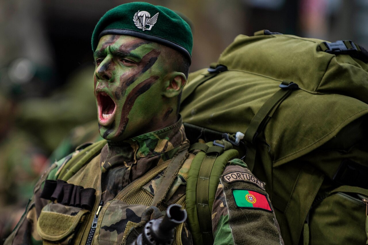 Portuguese soldier shouts.