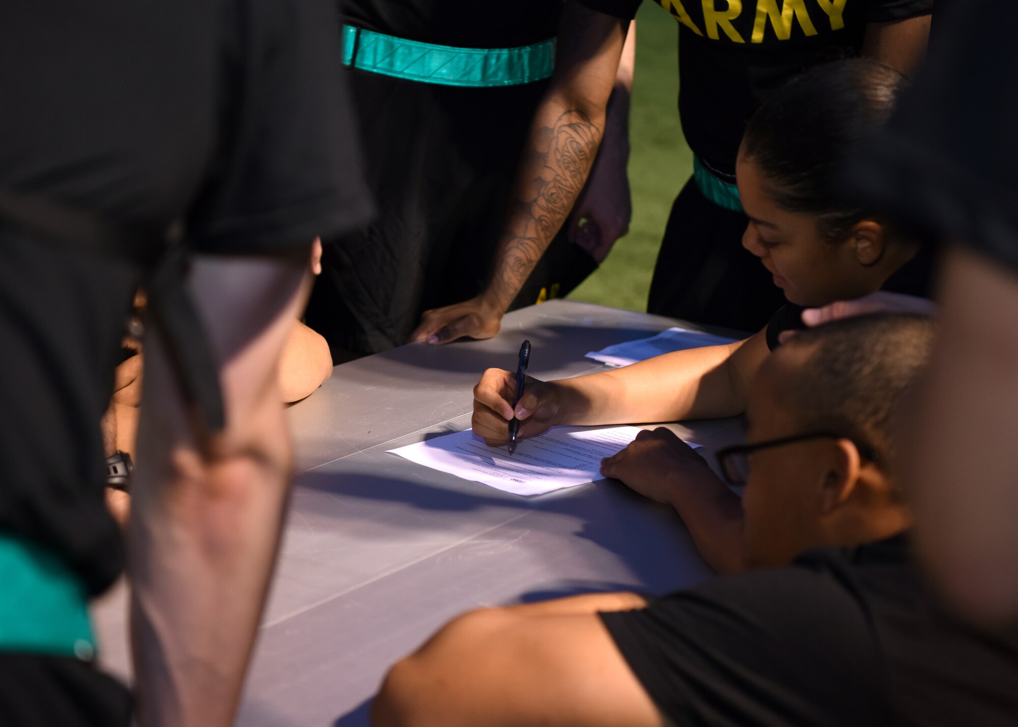U.S. Army Soldiers finished the Army Birthday PT Challenge with a quiz on the history of the nation at the Mathis Fitness Center on Goodfellow Air Force Base, Texas, June 14, 2019. The 344th Military Intelligence Battalion had to prove they were both brains and brawn for the challenge. (U.S. Air Force photo by Airman 1st Class Ethan Sherwood/Released)