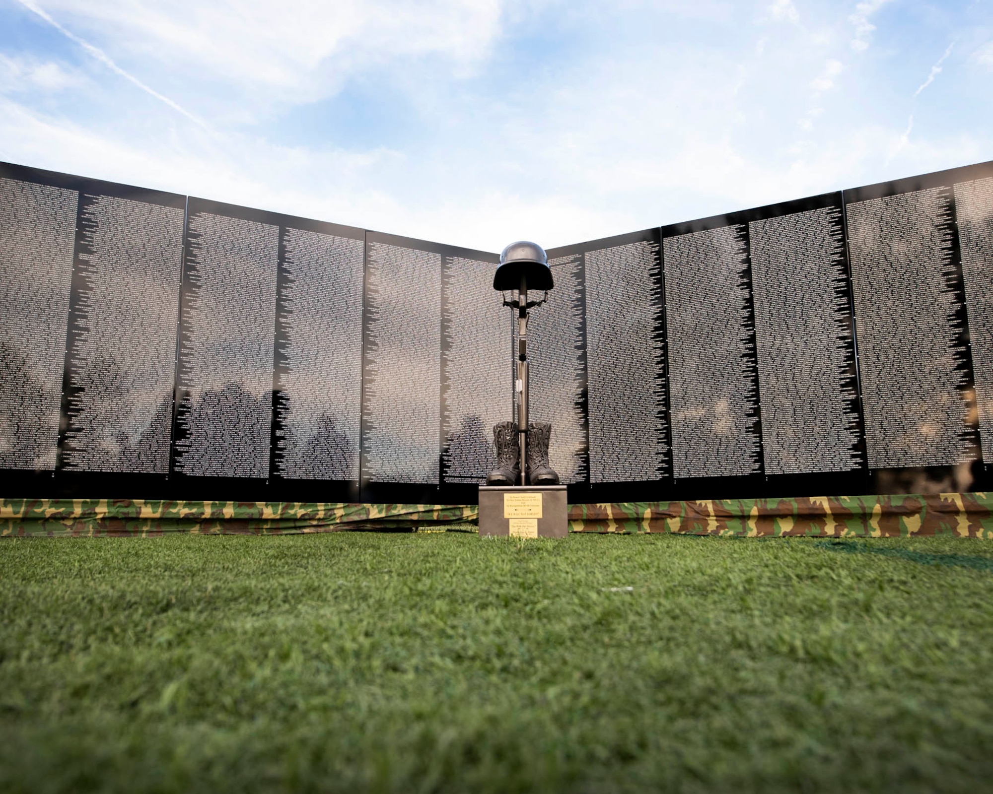 The sun sets on “The Moving Wall” following the opening ceremony for the display June 13, 2019 in Medical Lake, Wash. The Moving Wall is a half-size replica of the Vietnam Memorial that stands in Washington D.C. It travels throughout the country to bring the experience of visiting the memorial to those who may not have the opportunity to travel to the nation’s capital and will be in Medical Lake June 13-17 at the 200 block of South Prentis St. (U.S. Air National Guard photo by Staff Sgt. Rose M. Lust/Released)