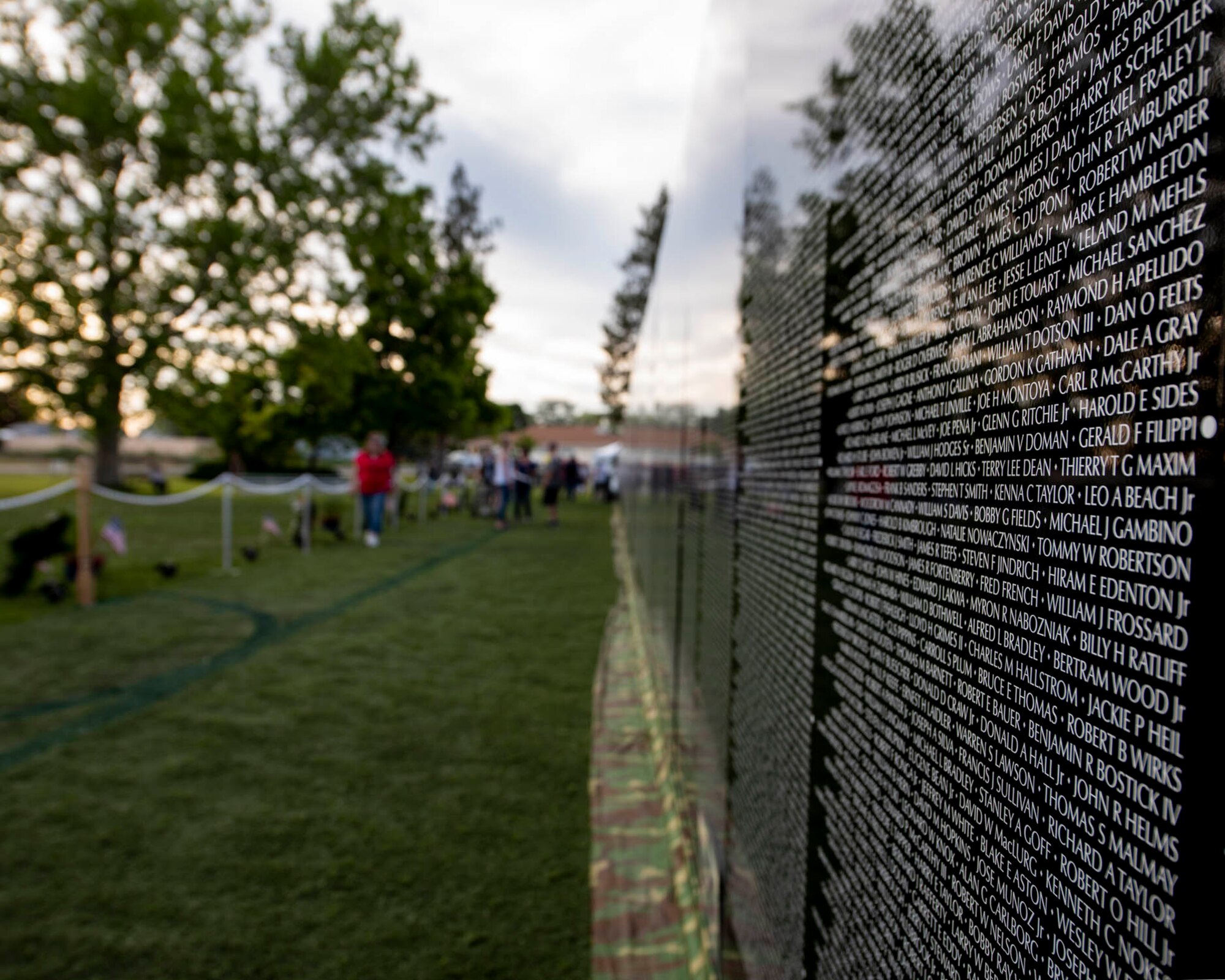 The sun sets on “The Moving Wall” following the opening ceremony for the display June 13, 2019 in Medical Lake, Wash. The Moving Wall is a half-size replica of the Vietnam Memorial that stands in Washington D.C. It travels throughout the country to bring the experience of visiting the memorial to those who may not have the opportunity to travel to the nation’s capital and will be in Medical Lake June 13-17 at the 200 block of South Prentis St. (U.S. Air National Guard photo by Staff Sgt. Rose M. Lust/Released)