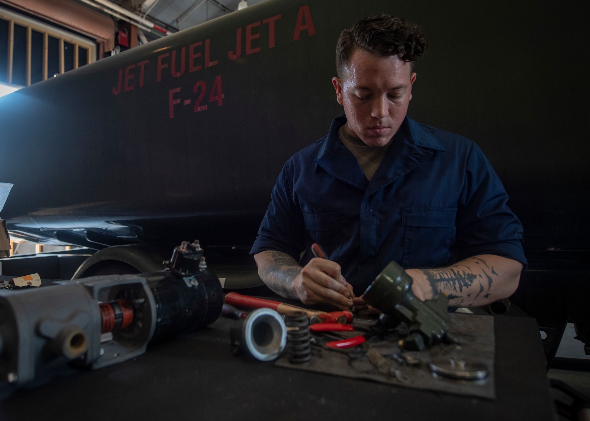 U.S. Air Force Staff Sgt. Jake Gonzalez, fire truck and refueling mechanic assigned temporarily assigned to the 325th Logistics Readiness Squadron, repairs a refueling truck component June 4, 2019, on Tyndall Air Force Base, Florida.