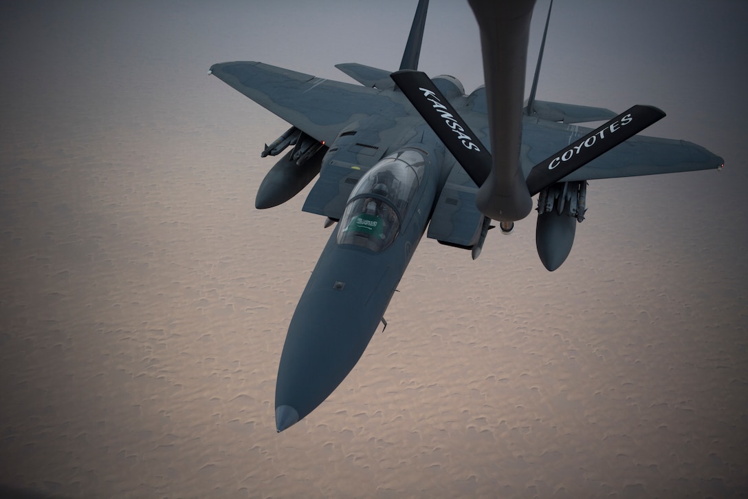 A photo of US and Saudi Air Forces F-15s flying together.