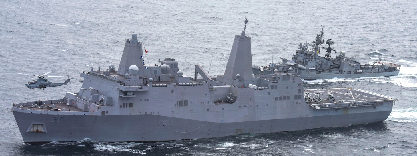 The San Antonio-class amphibious transport dock ship USS John P. Murtha (LPD 26) with embarked elements from the 11th Marine Expeditionary Unit (MEU) participates in maneuvering and communication drills with Indian navy ship, Rajput-class destroyer INS Ranvijay (D 55) in the Bay of Bengal, June 14. John P. Murtha, on its maiden deployment and part of the Boxer Amphibious Ready Group (ARG) and the 11th Marine Expeditionary Unit (MEU) team, is deployed to the 7th Fleet area of operation to support regional stability, reassure partners and allies, and maintain a presence postured to respond to any crisis ranging from humanitarian assistance to contingency operations.