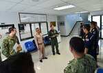 190606-N-UA460-0132 SATTAHIP NAVAL BASE, Thailand (June 6, 2019) U.S. Navy Rear Adm. Joey Tynch, commander, Task Force 73, speaks to U.S. and Royal Thai Navy (RTN) Sailors at the RTN Submarine Command Team Trainer during Cooperation Afloat Readiness and Training (CARAT) Thailand 2019. During CARAT, the U.S. and RTN navies spent 10 days conducting submarine operations and tatics knowledge exchanges and running integrated watch team scenarios in the RTN submarine simulator. CARAT, the U.S. Navy's oldest and longest continually running regional exercise in South and Southeast Asia, strengthens partnerships between regional navies and enhances maritime security cooperation throughout the Indo-Pacific.