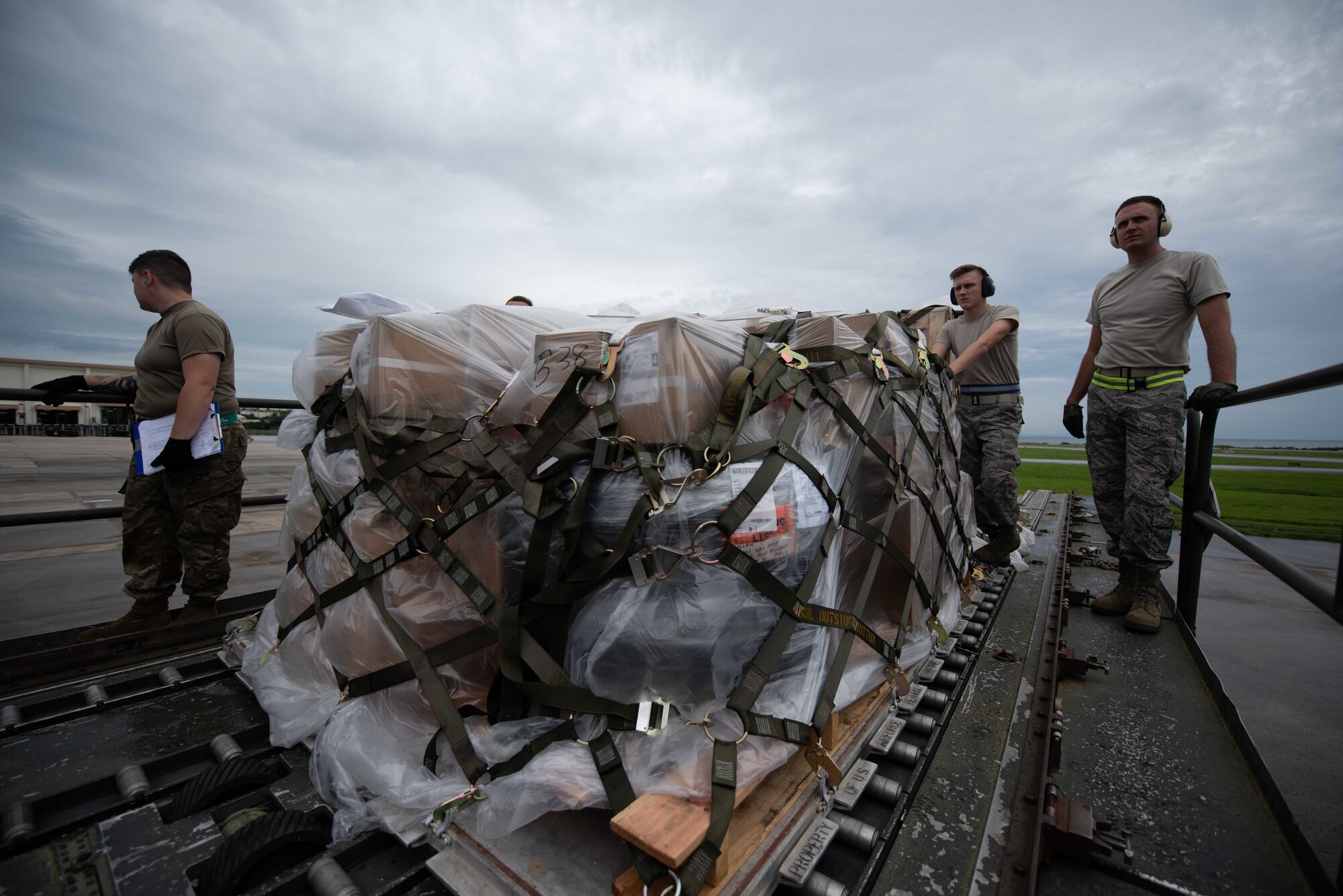 U.S. Air Force Airmen assigned to the 139th Logistics Readiness Squadron pose for a photo on a Boeing 747 during annual field training June 11, 2019, at Kadena Air Base, Japan. As an Air National Gaurd unit, the 139th LRS maintains a capable, ready force to support aerial port operations for both Federal and state mission sets. (U.S. Air Force photo by Senior Airman Kristan Campbell)