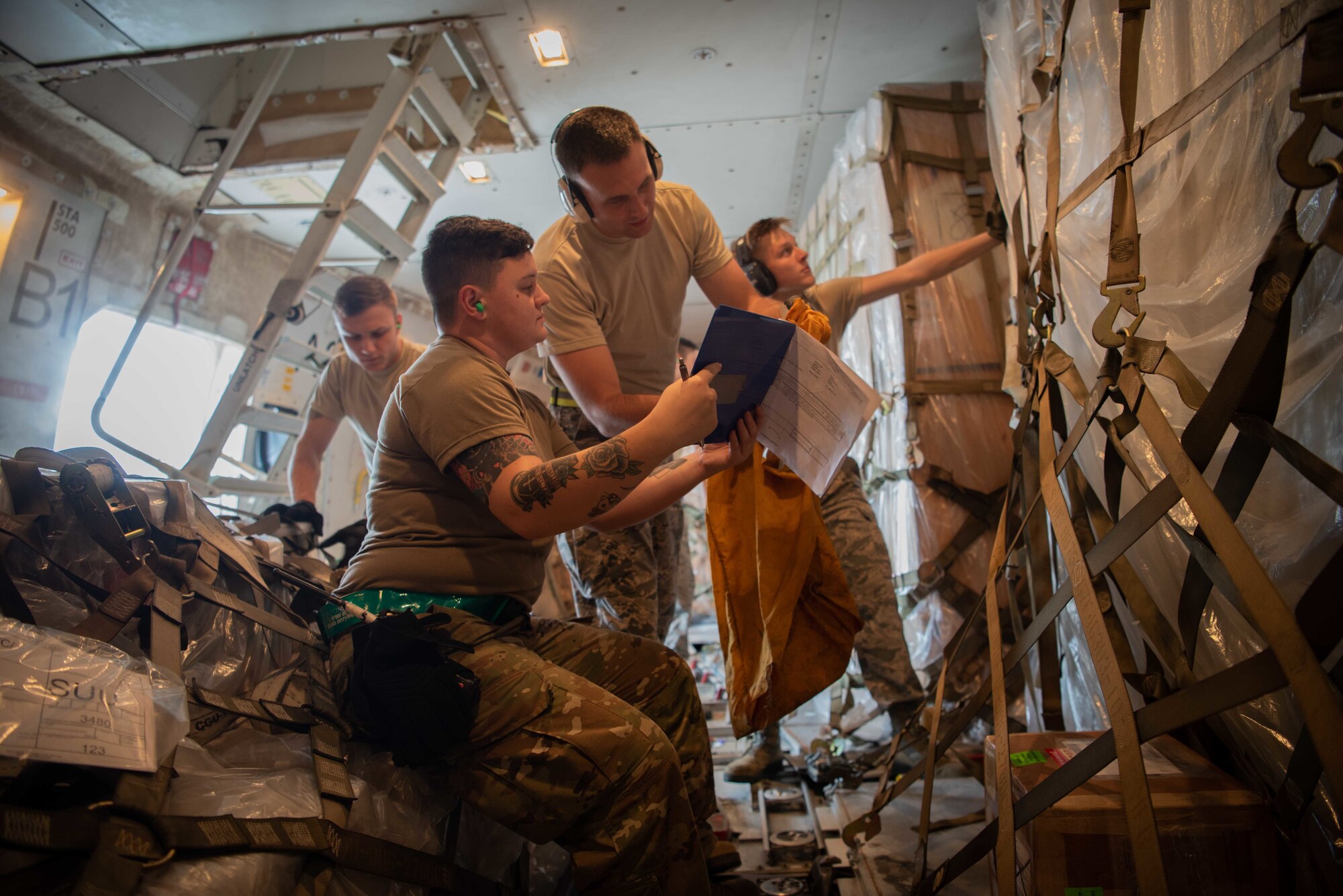 U.S. Air Force Airmen assigned to the 139th Logistics Readiness Squadron pose for a photo on a Boeing 747 during annual field training June 11, 2019, at Kadena Air Base, Japan. As an Air National Gaurd unit, the 139th LRS maintains a capable, ready force to support aerial port operations for both Federal and state mission sets. (U.S. Air Force photo by Senior Airman Kristan Campbell)