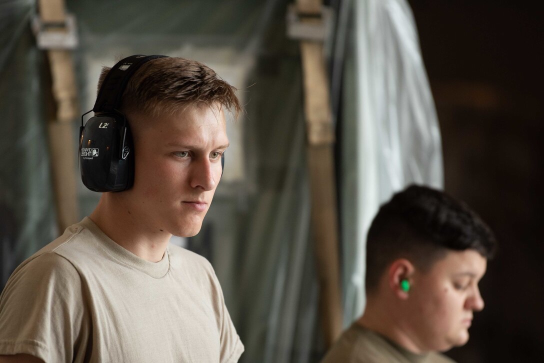 U.S. Air Force Airmen assigned to the 139th Logistics Readiness Squadron pose for a photo on a Boeing 747 during annual field training June 11, 2019, at Kadena Air Base, Japan. As an Air National Gaurd unit, the 139th LRS maintains a capable, ready force to support aerial port operations for both Federal and state mission sets. (U.S. Air Force photo by Senior Airman Kristan Campbell)