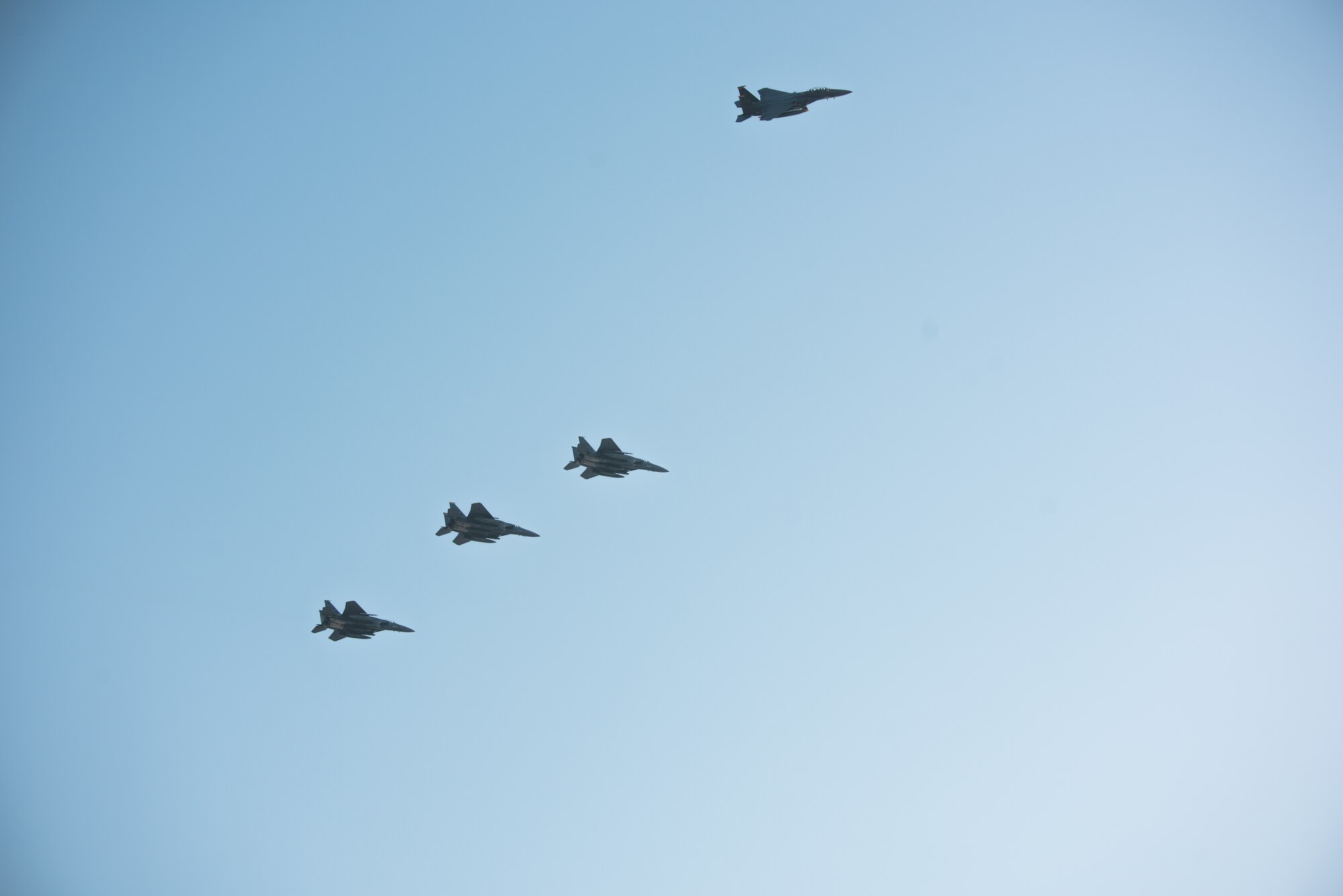Four F-15E Strike Eagles from the 336th Fighter Squadron, 4th Fighter Wing at Seymour Johnson Air Force Base, North Carolina prepare to land at Al Dhafra Air Base, United Arab Emirates, June 13, 2019. The F-15E’s joined ADABs inventory of other fighters to include F-15C Eagles and F-35A Lightning IIs. (U.S. Air Force photo by Staff Sgt. Chris Thornbury)