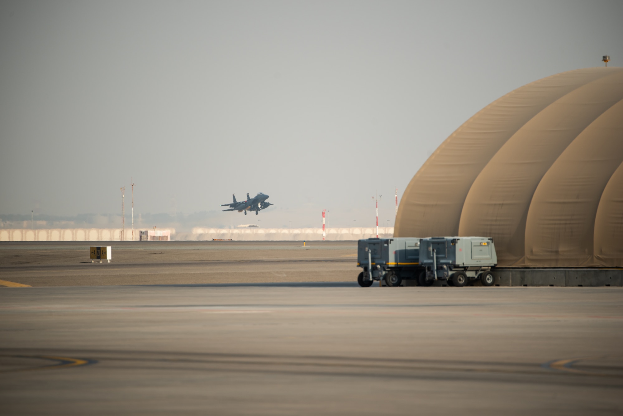 An F-15E Strike Eagle deployed from the 4th Fighter Wing at Seymour Johnson Air Force Base, North Carolina, lands at Al Dhafra Air Base, United Arab Emirates, June 13, 2019. F-15E’s are designed to perform in air-to-air and air-to ground operations in any environment. (U.S. Air Force photo by Staff Sgt. Chris Thornbury)